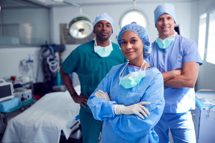 Cosmetic surgeons in operating room