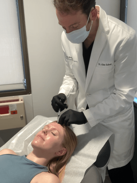 Dr. Alex Sobel performing Botox injections